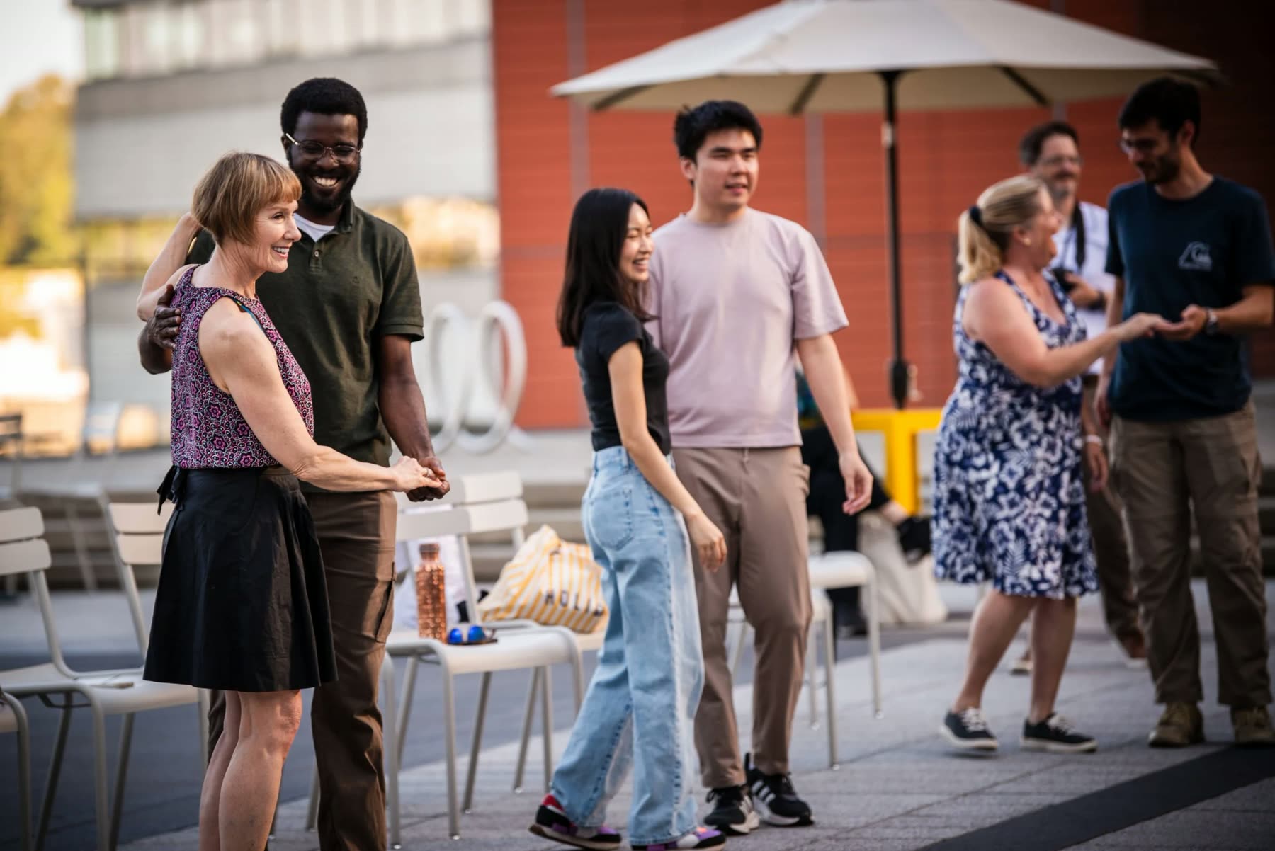 Dancers and onlookers at the free Swing Arts Foundation event at Bellevue City Hall in July 2025.